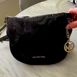 Authentic Michael Kors black croc print purse. Gently used.
